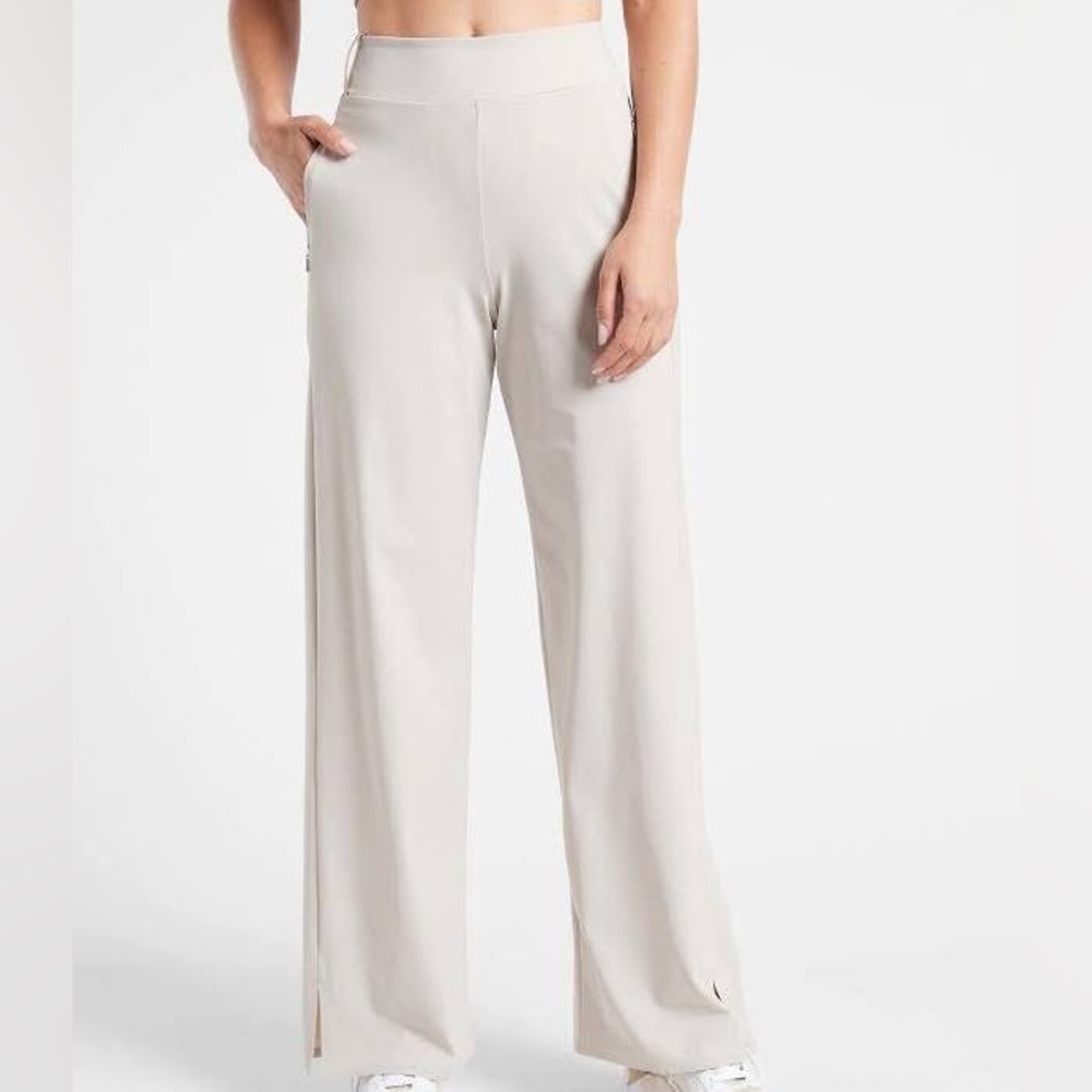 AVAILABLE - Athleta cosmic pant. Size 4. Beige. NEVER WORN